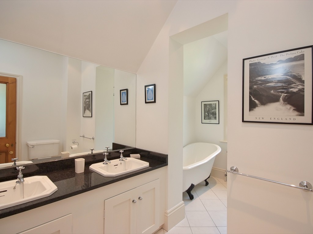 family bathroom with roll top bath and walk in shower